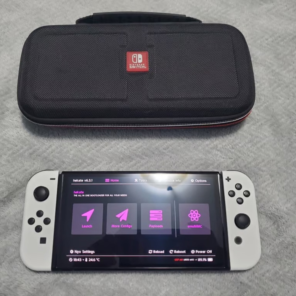 Nintendo Switch OLED with White Joy-Con and Black Carry Case